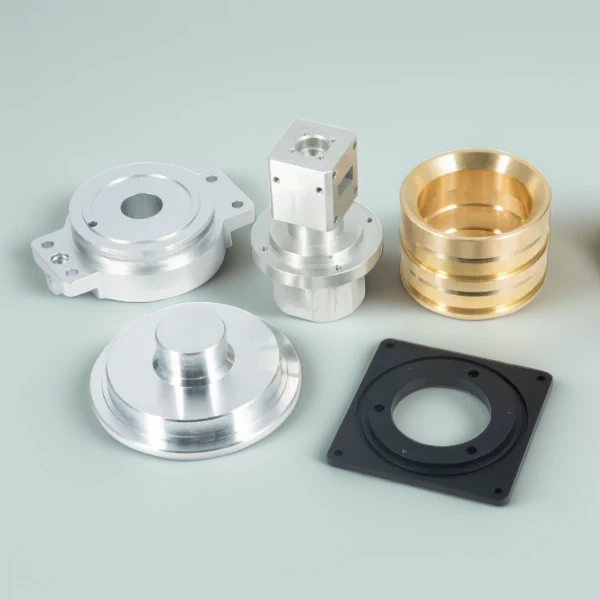 Assorted custom CNC aluminum parts with Type II color anodizing finishes